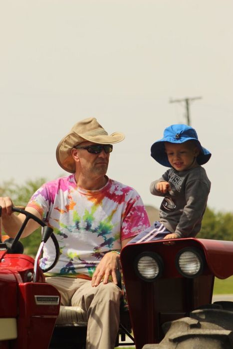 Tim and son on the tractor
